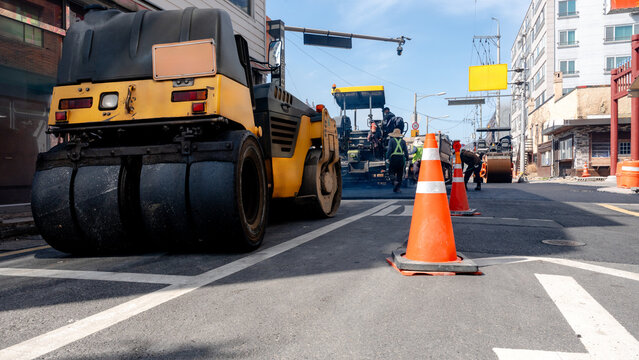 Road paving and repair work in urban setting
