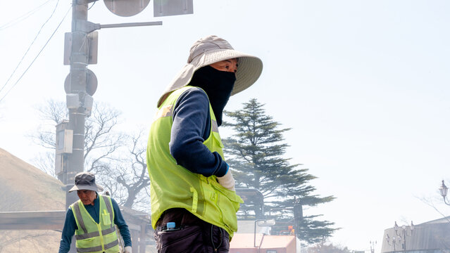 Workers paving a street in Gyeongju, South Korea