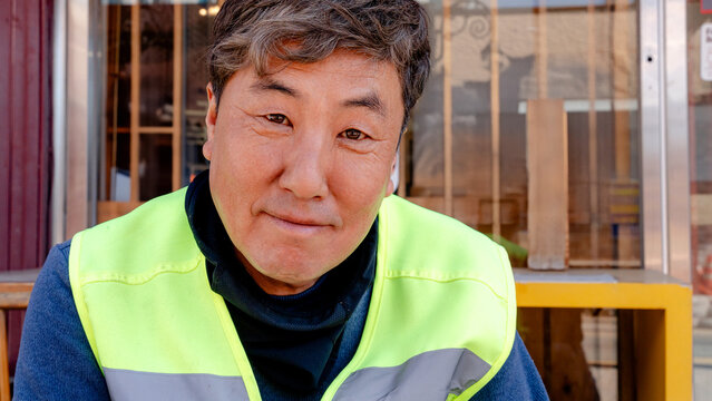 Worker on road repair project in South Korea