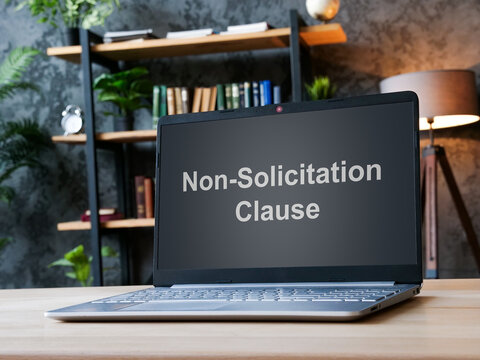 Non solicitation clause on laptop screen. Business legal agreement concept.