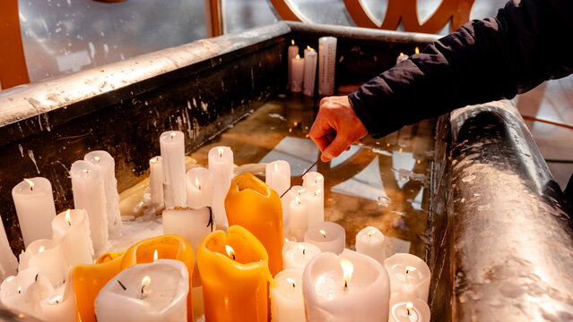 Lighting candles at Jogyesa Temple in Seoul