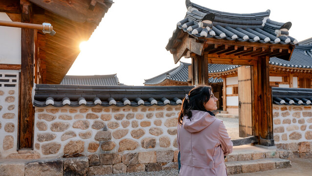 Traditional hanok gate at Jeolla Gamyeong with visitor