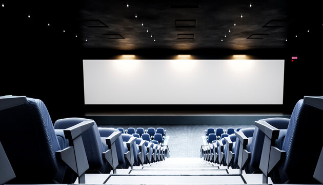 Empty movie theater with modern seating and screen