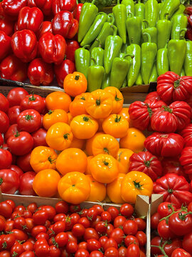 Fresh seasonal vegetables including peppers and tomatoes