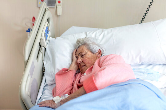 Elderly patient resting in hospital bed