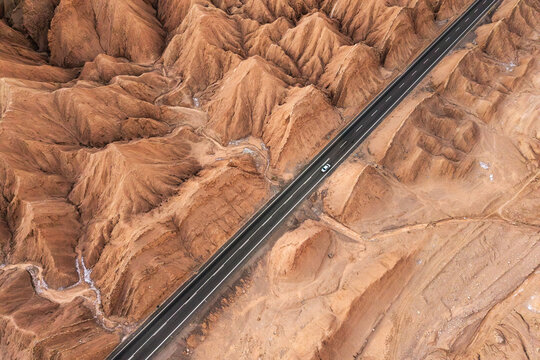 Aerial view of scenic road crossing the Atacama Desert