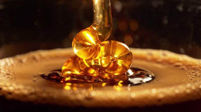 Golden honey syrup slowly pouring into frothy coffee, rich amber liquid, macro shot, morning breakfast, sweet indulgence, macro, food, drink