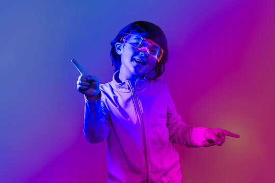 Kid in neon light wearing AR visor and imagining future
