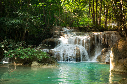 Erawan Waterfall turquoise pools amid lush jungle, Thailand