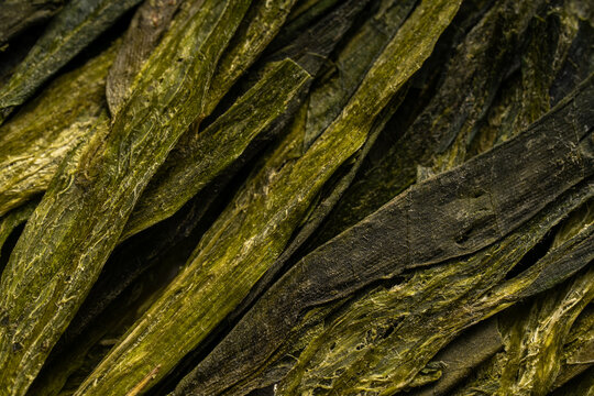 Close-up texture of dried Chinese green tea leaves