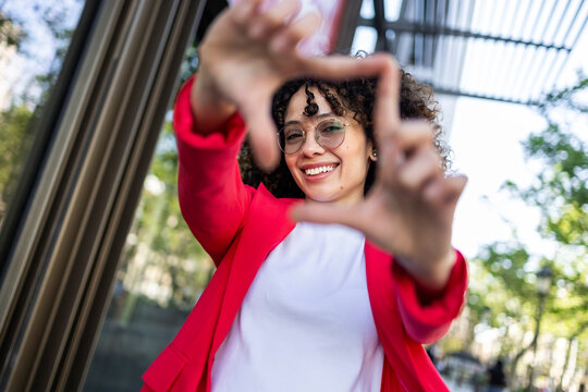 Woman enjoying urban lifestyle with a joyful smile