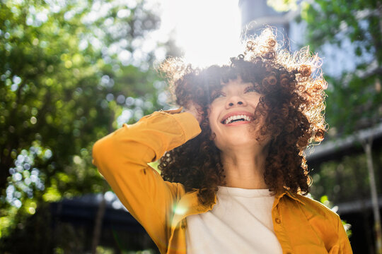 Hispanic woman enjoying a sunny day outdoors