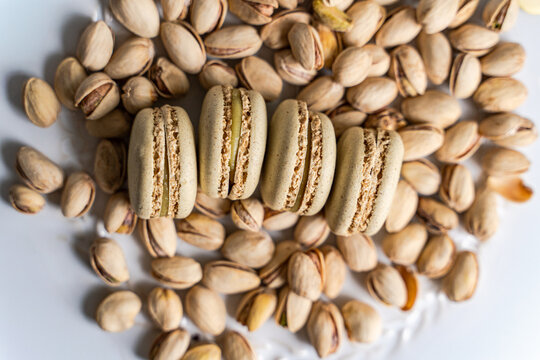Pistachio macarons with shelled nuts