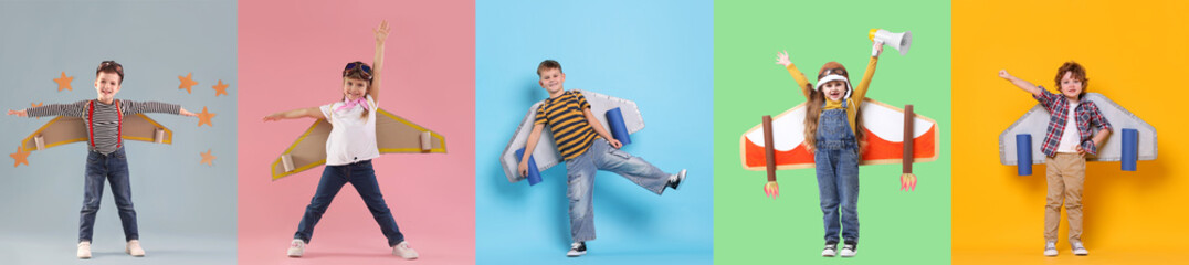 Cute children with cardboard plane wings playing pilot. Collection of portraits on colorful backgrounds. Fun science for kids © New Africa