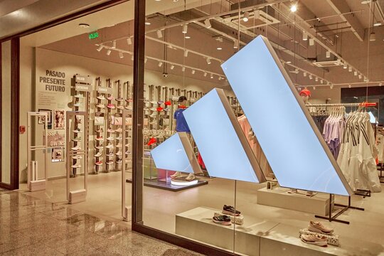 Ambato, Ecuador - June 09, 2025: Adidas store front in Mall de los Andes showcasing modern athletic apparel and footwear with vibrant displays and engaging ambiance
