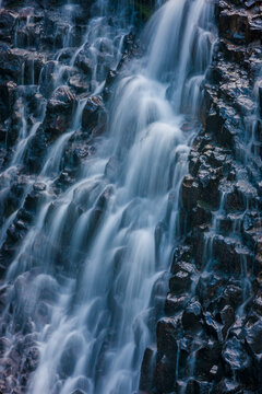 Water cascades over a waterfall in upper Washington State