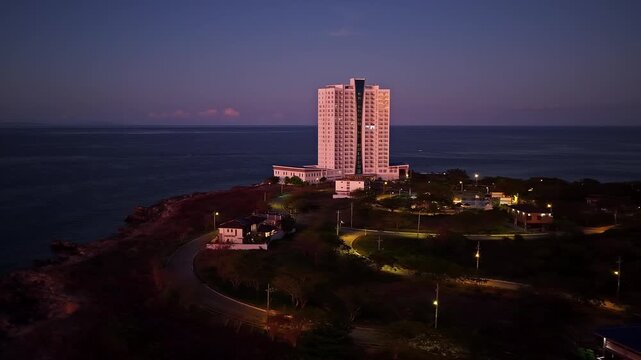 Dusit Thani Mactan Cebu resort in Philippines appearing at dusk, tropical island destination