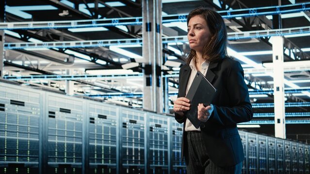 Data center system administrator looks at virtual graphics to optimize server load balancing. Server hub computer scientist uses wireframe mesh visualization to oversee systems, VFX overlay