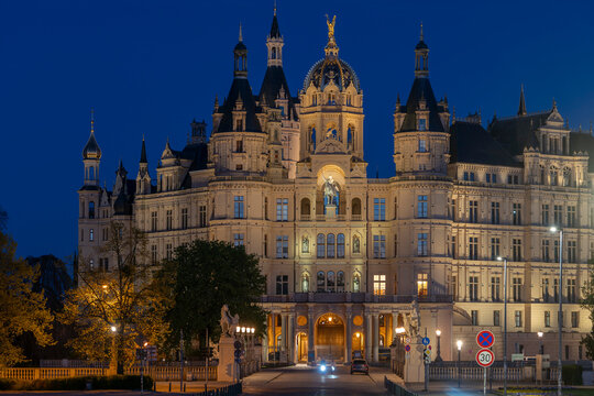The Schwerin Castle at evening; at blue hour (twilight).

