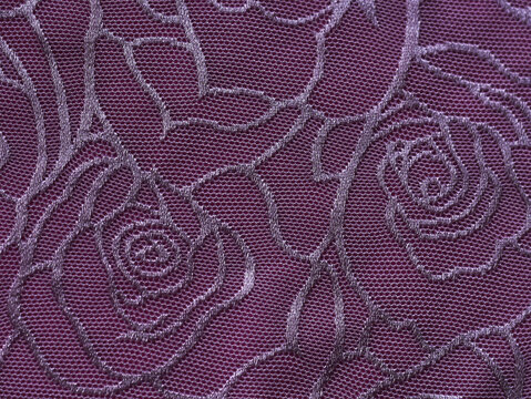 Vintage lilac  fabric with roses. Seamless purple material, pattern with flowers.Wallpaper, floral background.Design for print fabric. Simple lace seamless pattern.
