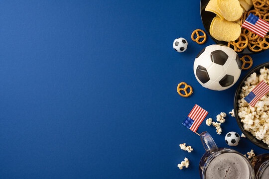 Football championship concept with American flags, soccer balls, snacks and beer for fan viewing