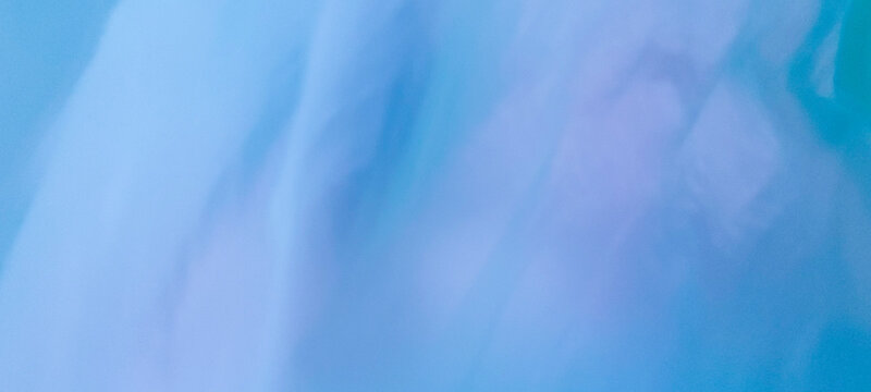 Dreamy turquoise translucent fabric background with delicate folds, soft lighting, airy texture, smooth pastel gradients, and contemporary abstract aesthetic.