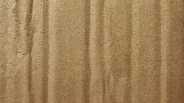 Brown cardboard texture stop motion background template. Creased blank surface animation.