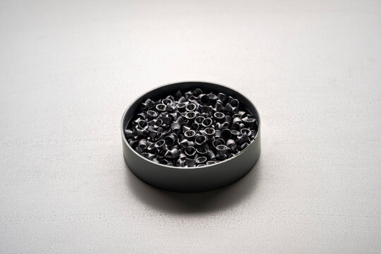 Airgun pellets on a white background.