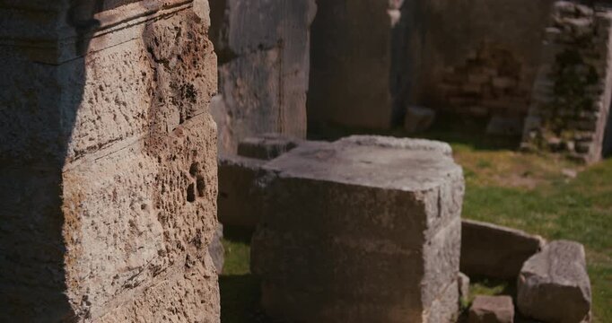 Close view of weathered stone blocks and ruins inside the ancient Pula Arena Roman amphitheater in Pula Croatia.