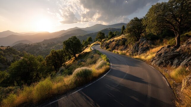 A winding road through a lush natural landscape at golden hour, with visible pavement texture, green hills, and warm sunlight in a cinematic composition.
