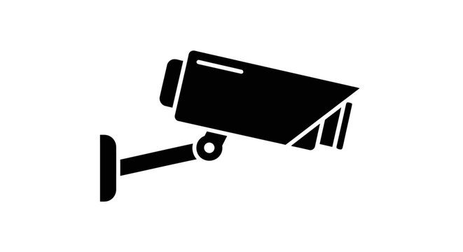 Black security camera on wall mount.