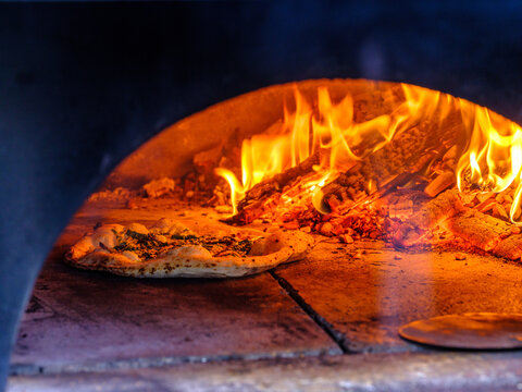 wood fired pizza in oven