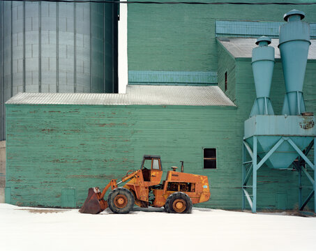 Heavy machinery parked in the winter.