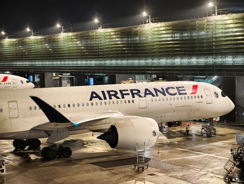 Paris,France-Nov.24th 2025: Close-up of Air France aircraft fuselage and brand logo at Paris Charles de Gaulle Airport at night