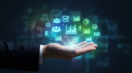 Fototapeta premium Hand displaying digital business icons floating above a palm, representing data analytics and technological solutions for modern enterprise with interconnected data