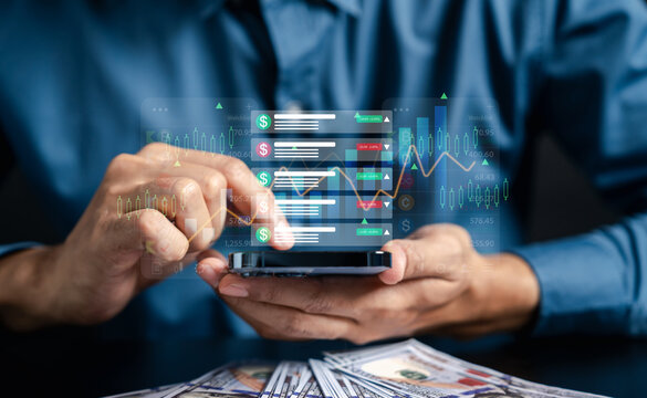 Stock market investment and finance trading on smartphone. Man using mobile phone analyzing candlestick chart data and watchlist for business wealth profit strategy with cash money.