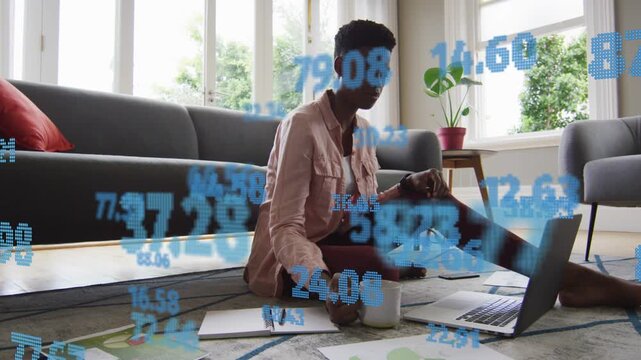 Woman checking phone sipping mug starting data typing laptop comparing charts with blue numbers