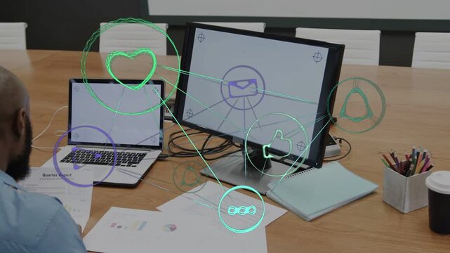 Man leaning scanning paper charts checking laptop screen AR icons showing business metrics review