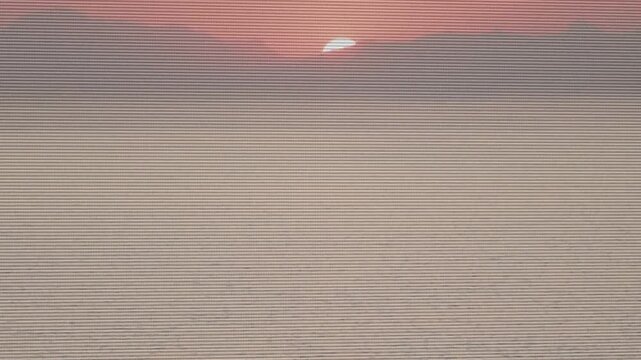 Frames starting, sun rising over ridge, crescent widening, warming sky, mist showing dawn, banding