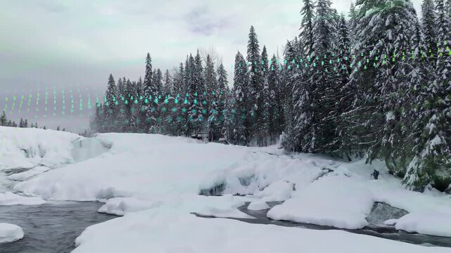 Man moving by trees in valley, teal arrows starting left sweeping above man mapping wind tech