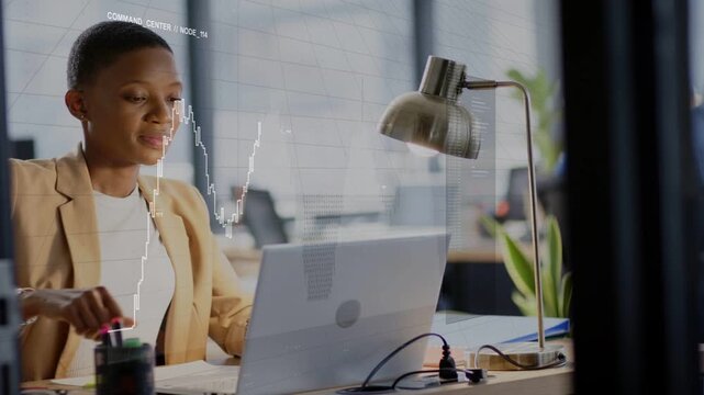 Business analyst typing on laptop and activating hologram chart, studying data while tasting mint