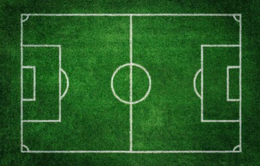 Naklejka premium Green grass soccer field with white marking lines