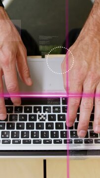 Vertical video: Man typing keys showing lines,dots passing over and under hands for tech work