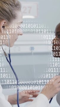 Vertical video: Dr placing stethoscope on patient, doing exam while binary overlaying chest