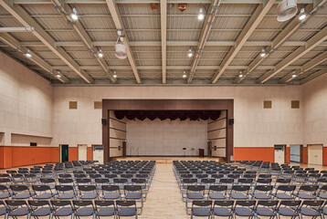 Naklejka premium Large Lecture Hall With Symmetrical Seating Layout
