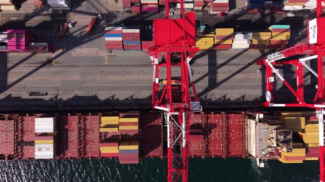 Aerial Top View Industrial Port Halifax Nova Scotia Canada Container Terminals Cranes And Cargo Ships Operating Daytime Highlighting Logistics Global Trade Supply Chain Maritime Industry 4K
