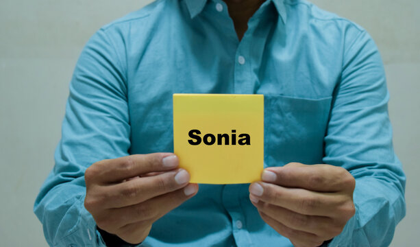 Businessman holds in hands a clipboard with the name of the Sonia.