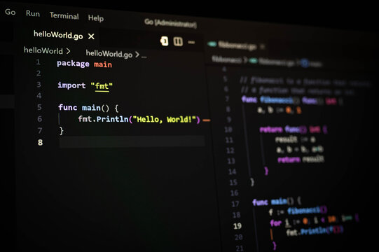 Close up of Go programming language source code displayed on dark screen with example in code editor. Software development, backend engineering, coding technology and developer workspace concept.