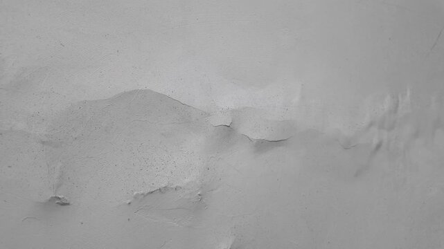 Footage of blistering paint and bubbles caused by water leakage or dampness behind the wall surface. Perfect for home improvement and waterproofing service content.