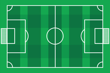 Fototapeta premium Green soccer field with white lines and goals on both sides